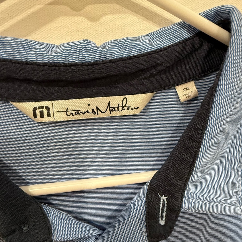 Travis Mathew polo. XXL. Good condition. Blue, light blue.